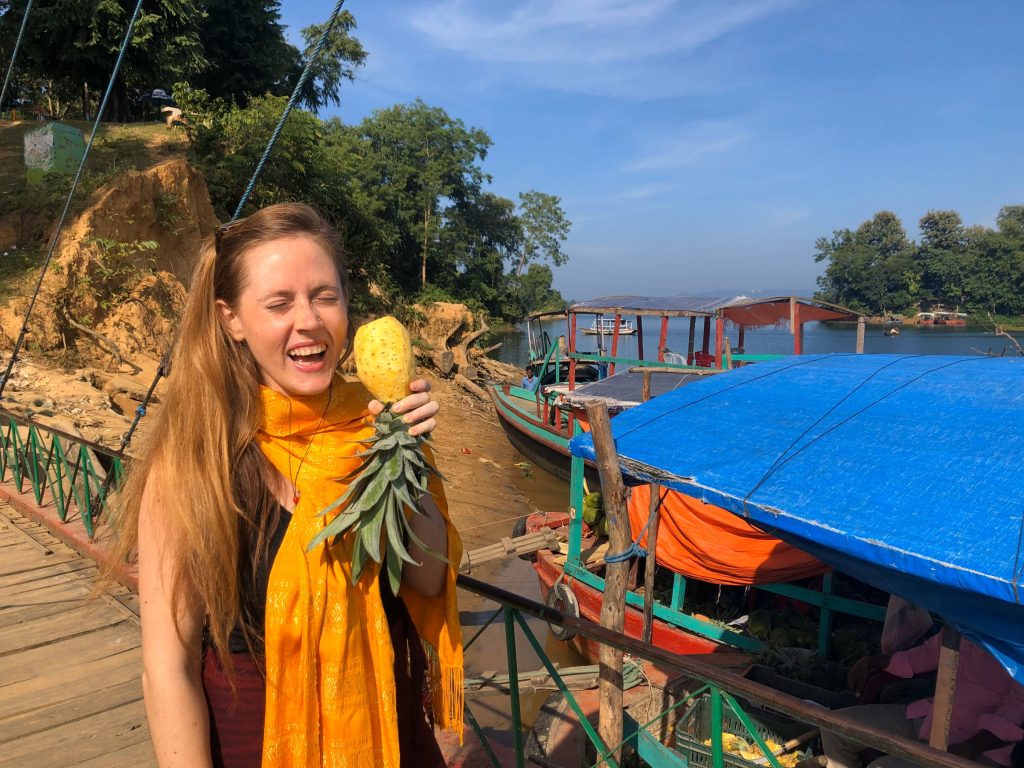 Sarah-Jane Saltmarsh giggling with a local pineapple